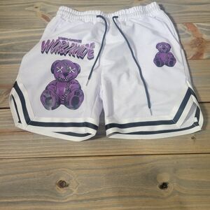 White Shorts with Purple Graphic